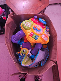 Box of infant toys. 