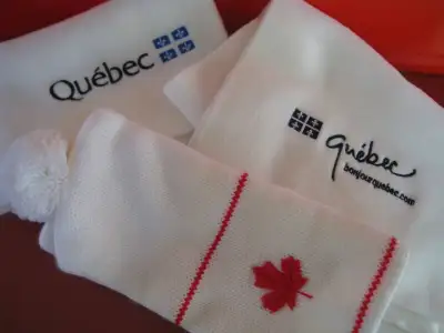 2 designs of the Quebec scarves, each is about 58” x 9” in size.