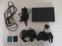Sony Playstation 2 console with two controllers