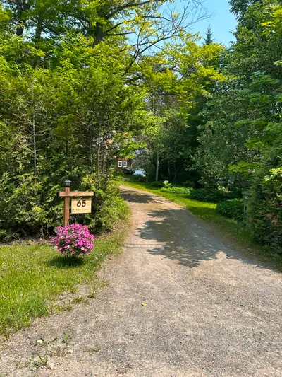 Outstanding view of this prestigious clean lake .. you have everything included .. plus a canoe and...