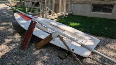 Complete, ready to sail except for minor sewing on one sail seam. Includes mast, rudder and dagger b...