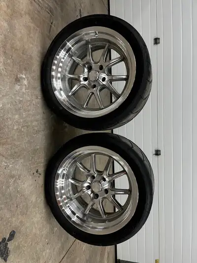 2 18x10 with 5.5 inch back spacing and 0 offset 5 on 4 3/4 Chevy bolt pattern
