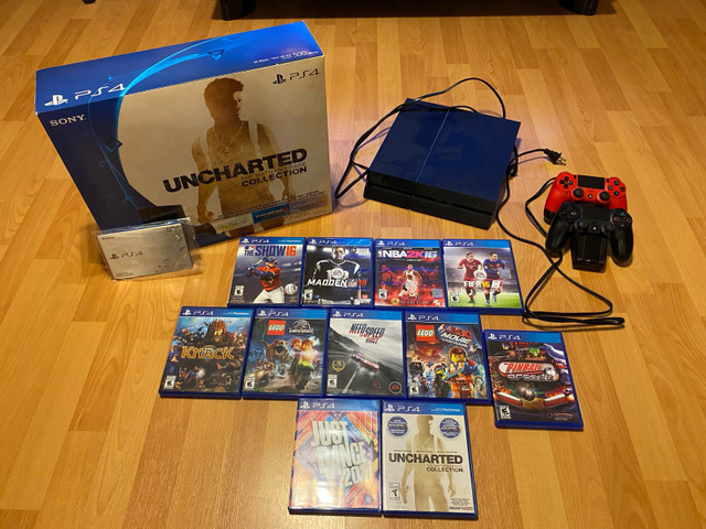 Sony PS4 500GB with 2 controllers, charger and 11 games in Sony Playstation 4 in Moncton