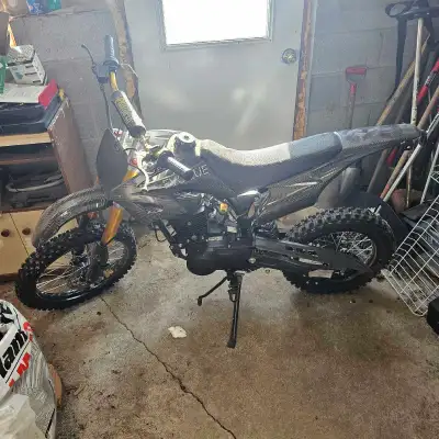 I'm selling a used 150cc Chinese pitbike. The body has a carbon fibre-look wrap. It's used and in fa...