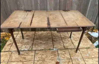 This is a used antique seamstress folding table, Please review the photos for a clearer view of its...