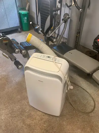 Keep cool this summer with this portable stand up air conditioner! It's in used condition but works...