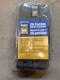 Bucket apron for storing work tools