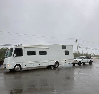 well taken care of stored in doors windows and roof recently resealed sat dish large inverter genset...