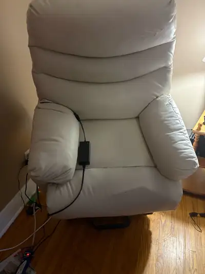 Leather assisted lift recliner chair., View more
