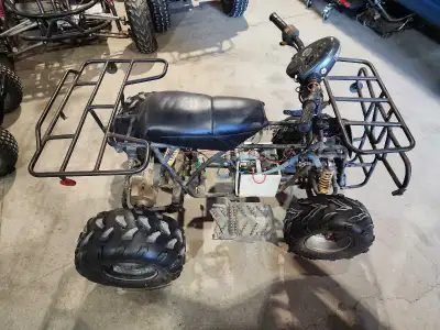 This was originally a 50cc Chinese quad. It has been converted to electric using the drive axle from...