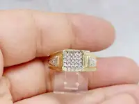 This beautiful 10k diamond ring features a total of 0.30 carat g