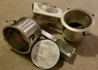 Two New Halo H7 6" Aluminum Recessed Lighting Housing and two 6" Satin nickel baffle trim. Brand new...