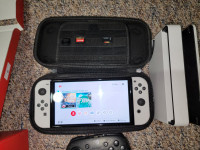 Nintendo Switch OLED + 2 games + pro controller + more!!!