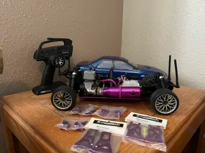 Extremely clean condition, Vintage HPI RS4 has had only one tank of fuel trough it since new. Has be...