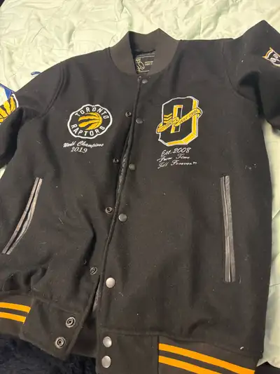 This pre-owned OVO Toronto Raptors World Champions 2019 bomber jacket features a classic black wool-...