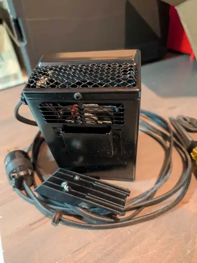 Small space heater often used in car. Uses regular 120 plug. All specs can be found - ...