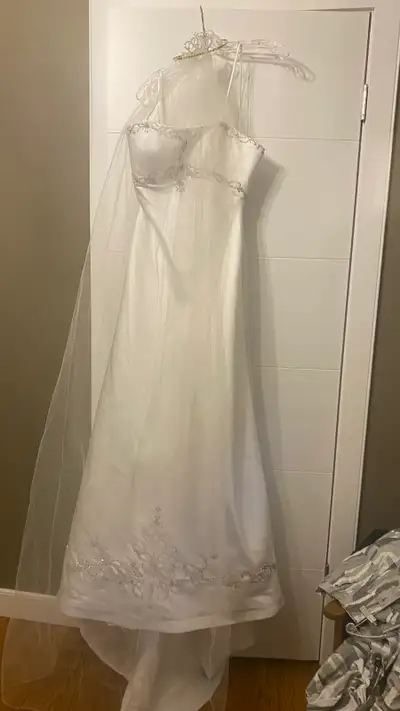 Selling a beautiful Mon Cheri Bridal wedding dress, a vision in white with delicate silver embellish...