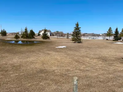 This spacious lot at Humboldt Lake features an unobstructed view of the lake , as well as close prox...