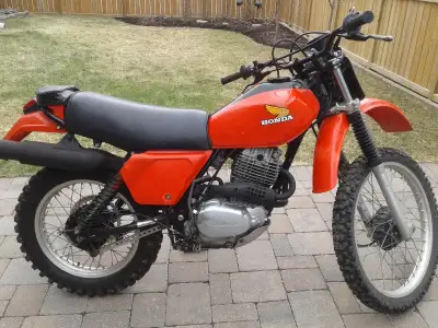 Starts,runs and drives great,new sealed chain and sprockets,new fuel petcock,inside of gas tank like...