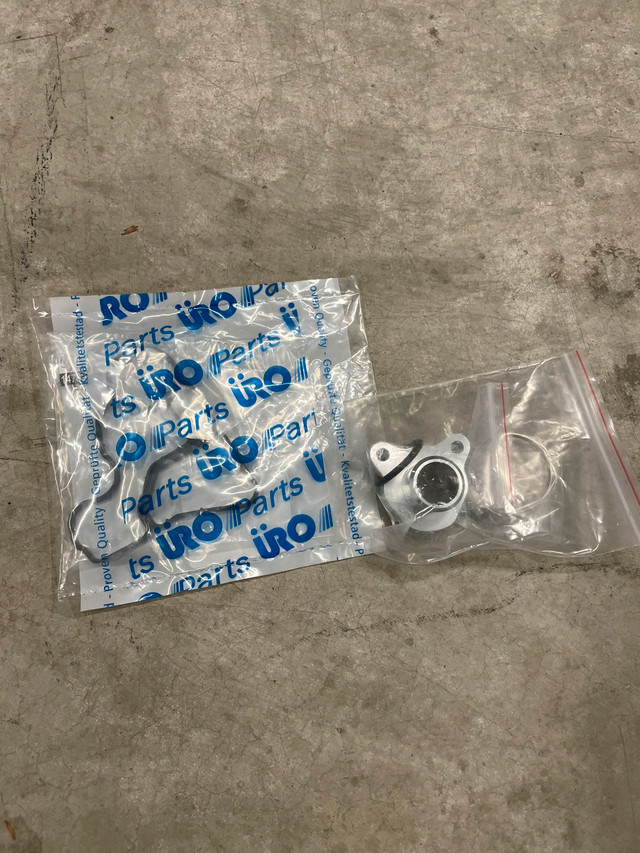 BMW n52 oil filter housing gasket and upgraded coolant flange Engine