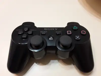 Original black Dualshock 3 controller for the PS3. In decent condition with typical minor imperfecti...