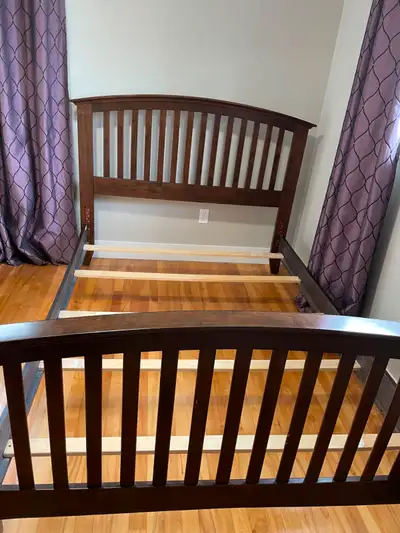 Beautiful dark wood bed frame with slats. Double size. In excellent condition. Easy to assemble. Mus...