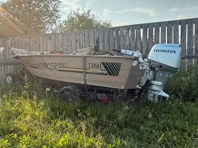 14 ft fishing boat and . Raise Bow platform with seat. Electric fill pump and built in live well. St...