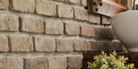 Timeless yet cost-effective design - natural stone veneer and...