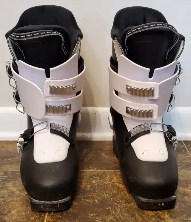 Used children's skis and ski boots for sale.