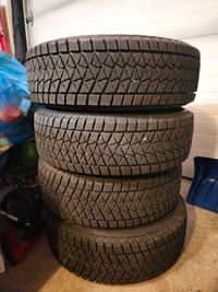 4 Bridgestone Blizzak winter tires on steel rims 215/70 R 16