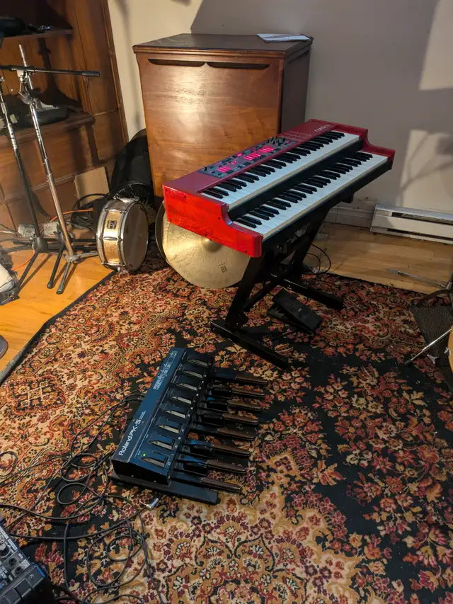NORD C1 double manual organ with Roland midi  pedals  for sale.63735875639041120