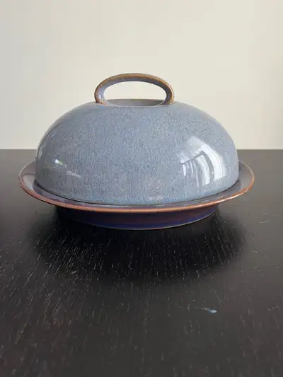 I am selling a used Denby Nile butter dish, a stylish and functional addition to any kitchen. This b...