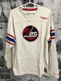Men’s XL CCM early logo Winnipeg Jets distressed look sweater.