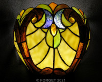 For Sale. River of Goods Stained Glass Wireless LED Wall Sconce