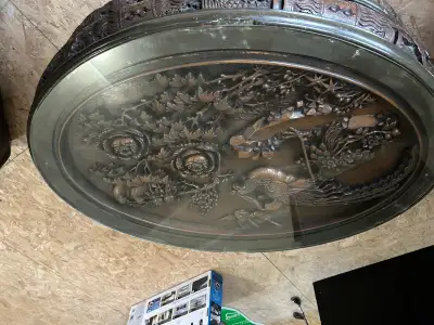 1963 Indonesian carved teak coffee table, View more