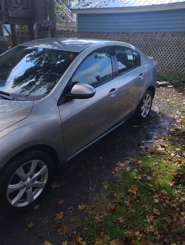 MAZDA 3 Sedan with good mileage and ready to drive.