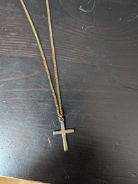 Gold necklace with cross