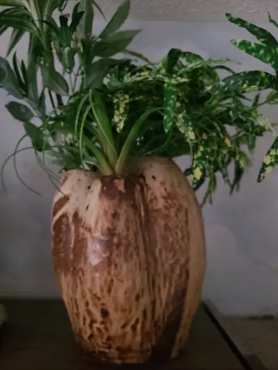 3 "pocket" pottery vase in mottled tan and brown glaze, View more