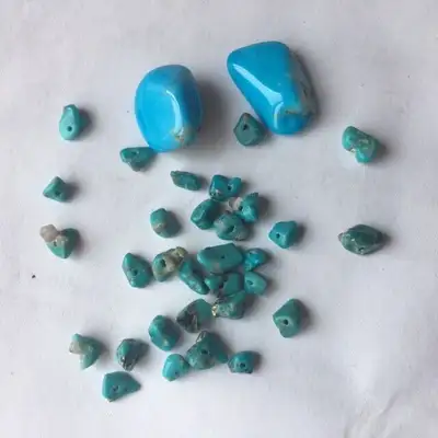 A group of small, antique quality turquoise beads from Taos New mexico in 1974, and a couple of chun...