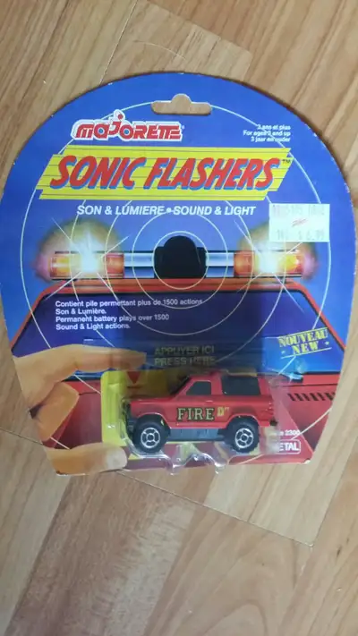New Carded Vintage Majorette Sonic Flashers Fire Truck.Appears like a Bronco Type Vehicle.Marked for...