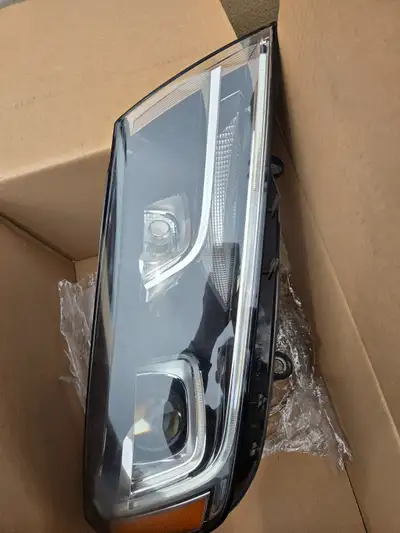 Right side headlight module with plugs and front lens only. (see photos) 2 LEDS U shaped and strip e...