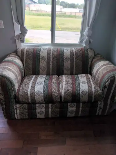 Decent couch aside from some shreds and rough seems. It's about 6ft long and 3ft wide. Covered in fu...
