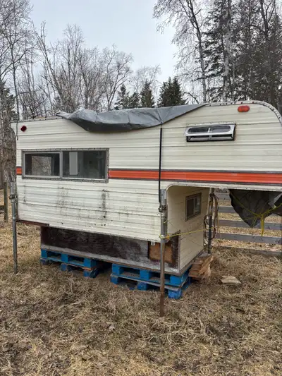 8’ okanagan camper. Fridge, stove, sink, furnace, everything works, no leaks.