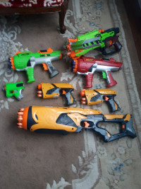 Lot of nerf gun dart tag and zombie strike bow  with darts 