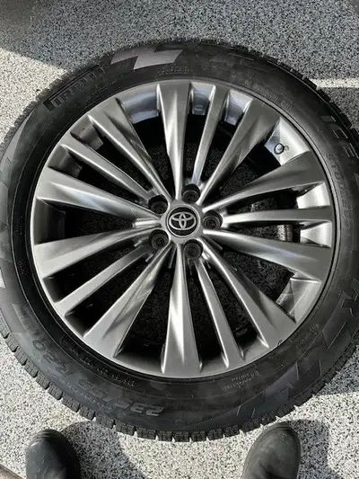 Factory Highlander rims with new Pirelli Ice Zero tires P235/55/20 with 5X114.3 bolt pattern. Comple...