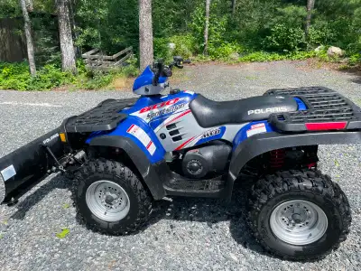 Polaris Sportsman 600 Quad with 2 up seat and snow plow. Comes with a Polaris Oil change kit and a P...