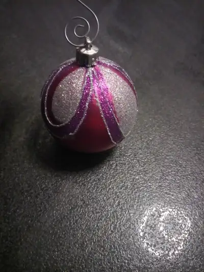 Hello, Selling 7x glitter decorated, pink Christmas ornaments with hangars. Material is glass. $5, m...