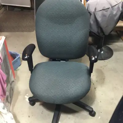 This office chair offers great support for long workdays, featuring adjustable height and a comforta...
