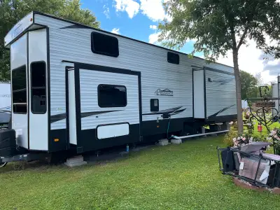 Welcome to your home away from home!!! 2021 Keystone Residence 40FLFT Destination trailer that has i...