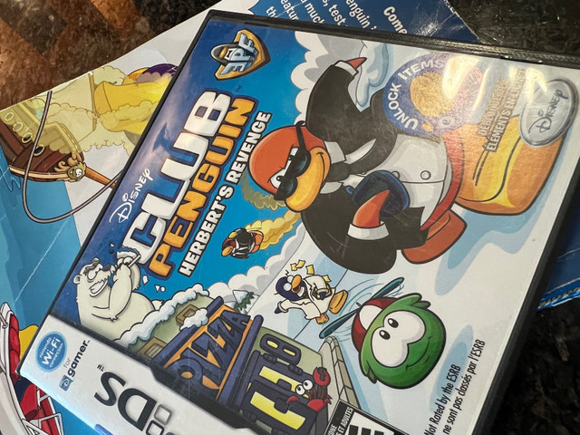 Club Penguin Herbert’s Revenge with manual plus official guide in Nintendo DS in Winnipeg - Image 3